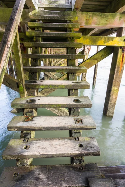 Steps beneath jetty — Stock Photo, Image