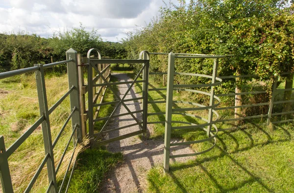 Iron kissing gate in good condition. Type of stile style. — Stock Photo, Image