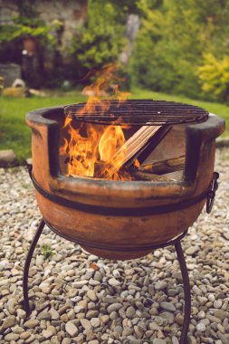 terracotta barbecue pit in italian country house