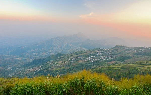 Landscape of rural city in mountain at  sunset time. — Stock Photo, Image