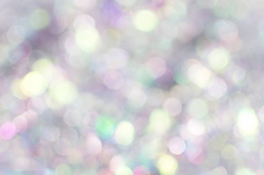 Bulanık gümüş festival ışıkları. Noel zamanı konsepti. Mükemmel Noel geçmişi.