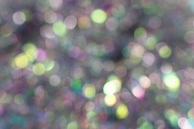 Gri, ışıl ışıl, gri, soyut arka plan ve noel ışıkları. Şenlik konsepti. Metnin için yer.