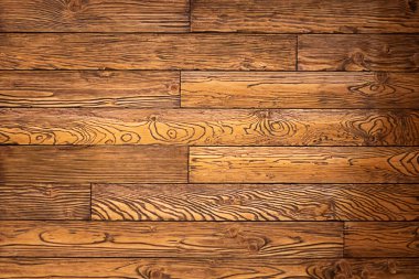 Tahta zemin, belirgin tahıl ve sıcak tonlara sahip, kırsal tasarım projeleri için uygun bir zemin..