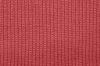 Kırmızı örgü kumaş, desen, dikişler ve moda ve tasarım için rahat tekstil görüntüsü..
