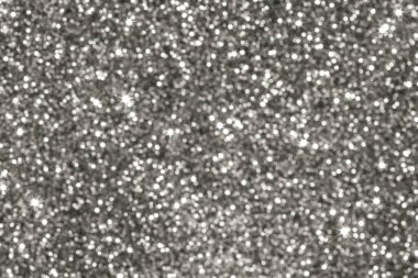 Küçük ışıklardan oluşan yoğun bir alan ışıl ışıl metalik bir doku oluşturuyor, 2026 yılının şenlikli ve lüks görsel gösterisi için mükemmel.