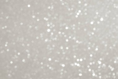 Tarafsız, ışıl ışıl arka plan. Tatil, düğün ya da ürünün 2026 yılının görsel tanıtım rengine uygun hassas noktalar.