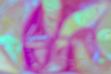 Modern yaratıcı tasarım için ideal bulanık pembe ve nane tonları ile yumuşak rüya gibi pastel holografik arka plan.