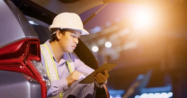 engineer working on digital tablet at construction site