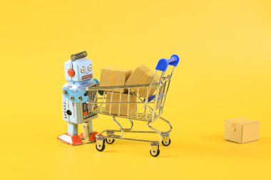 Klasik robot ve alışveriş arabası sembollü online alışveriş konsepti