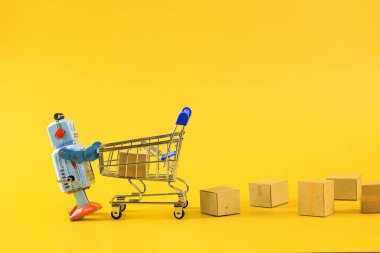 Klasik robot ve alışveriş arabası sembollü online alışveriş konsepti