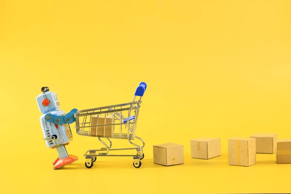 Oldtimer Roboter Und Online Shopping Konzept Mit Warenkorb Symbol Stockfoto