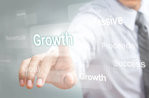Hombre de negocios apuntando concepto de crecimiento —  Fotos de Stock