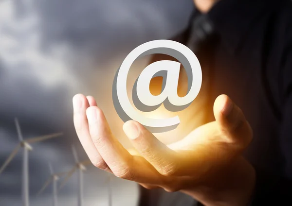 Email icon in businessman hand, contact us — Stock Photo, Image