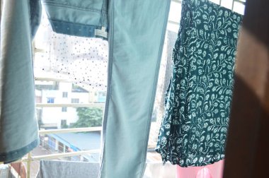 clothes hanging on the window