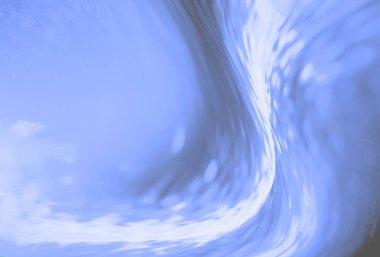 Yumuşak tahıl dokusuna, dalgalı şekillere ve pürüzsüz mavi tonlara sahip modern soyut arka plan. Pankartlar, posterler, duvar kağıtları ve yaratıcı tasarımlar için ideal..