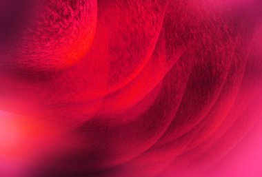 Yumuşak tahıl dokusuna, dalgalı şekillere ve pürüzsüz kırmızı tonlara sahip modern soyut arkaplan. Pankartlar, posterler, duvar kağıtları ve yaratıcı tasarımlar için ideal..