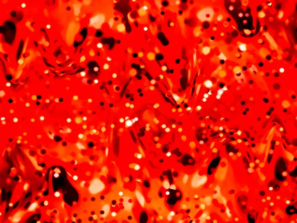 Kırmızı bokeh ışıkları, yumuşak daireler ve parıldayan beneklerden oluşan canlı ve soyut bir arkaplan. Enerji, derinlik ve fütüristik atmosfer arayan teknoloji, bilim veya yaratıcı projeler için mükemmel..