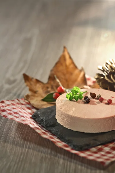 Slice of foie gras and pepper — Stock Photo, Image