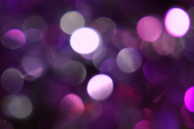 Koyu arka plan üzerinde Menekşe belirsiz daireler