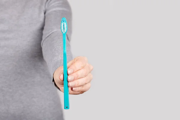 Hand Blue Toothbrush Grey — Stock Photo, Image