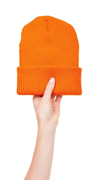 Hand Mit Orangefarbener Wintermütze Isoliert Auf Weiß — Stockfoto