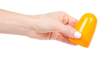 Beyaz balçıklı sarı şişeli el.