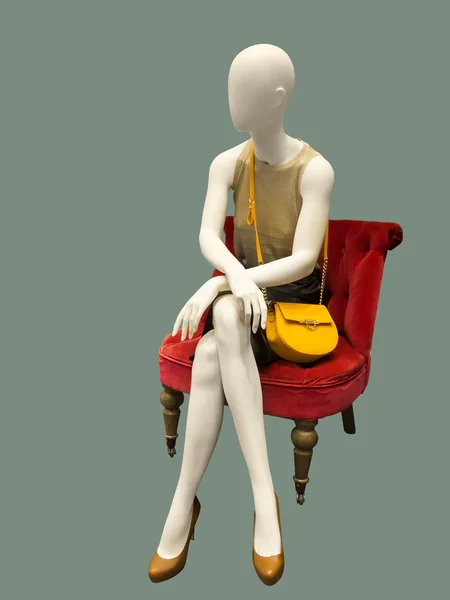 Сидящий женский манекен — стоковое фото