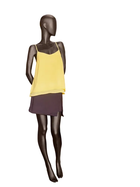 スカートと黄色の上に身を包んだ女性マネキン. — ストック写真