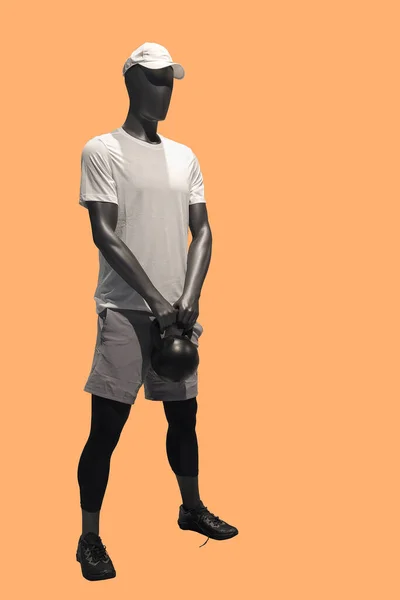 Full length male mannequin wearing sport athletics clothes. Isolated. No brand names or copyright objects.