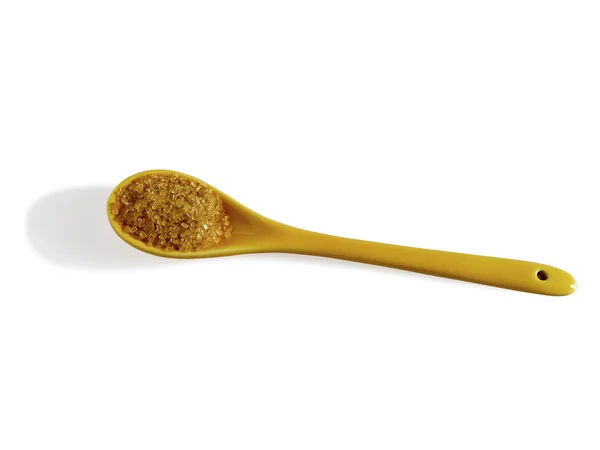 Brown sugar in tea spoon — Stock Photo, Image