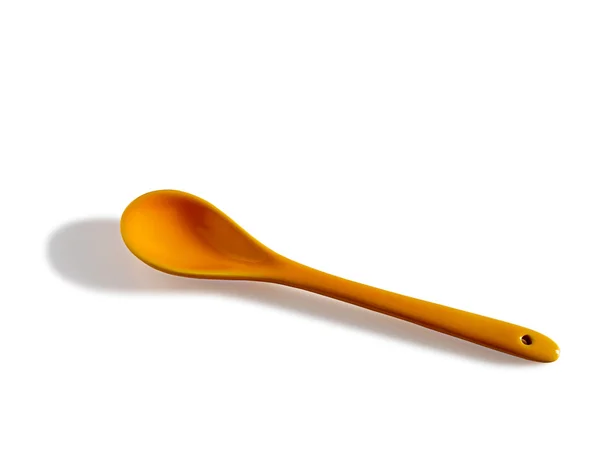 Yellow ceramic tea spoon — Stock Photo, Image