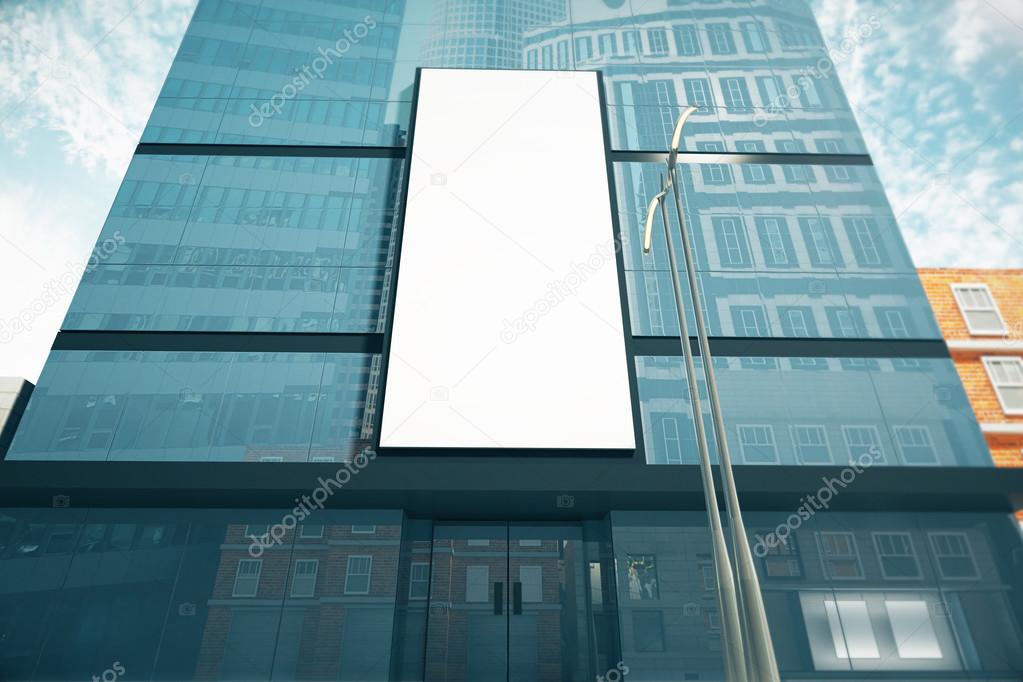 Blank white billboard on business center