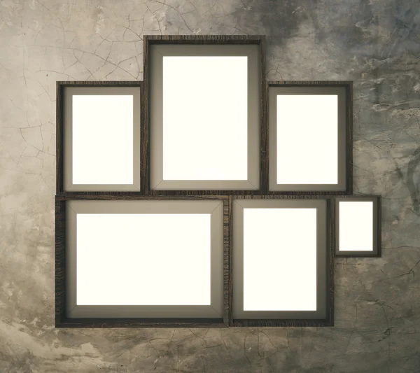 Brown broad pattern wall with multiple blank picture frames, 3D — Stock Photo, Image