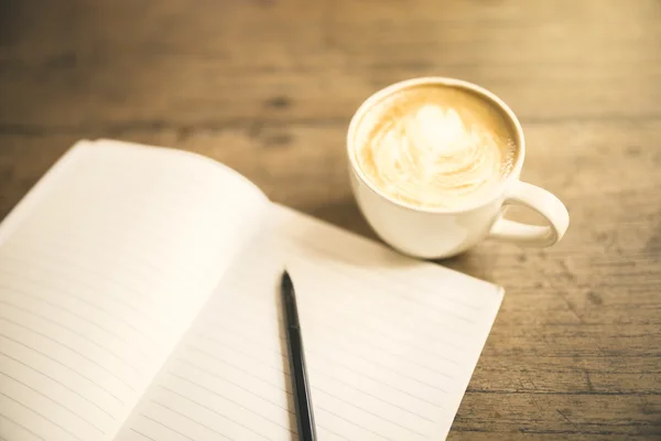 Cup of coffee with diary — Stock Photo, Image
