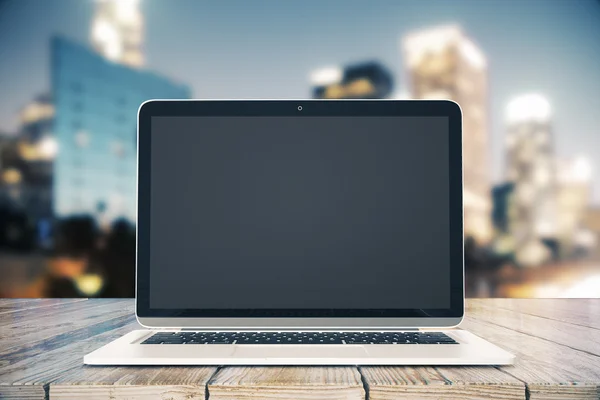 Desktop with blank laptop screen — Stock Photo, Image