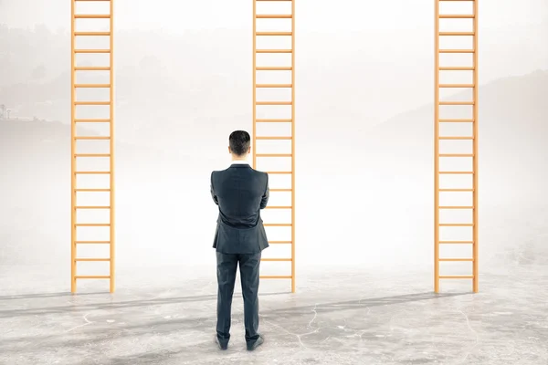 Thoughtful businessman career ladders — Stock Photo, Image