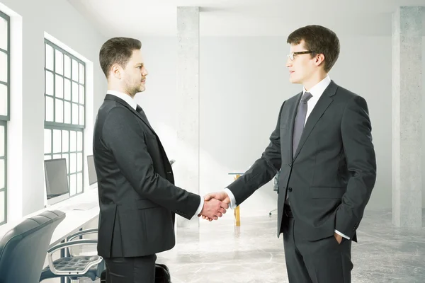 Businesspeople shaking hands Royalty Free Stock Images