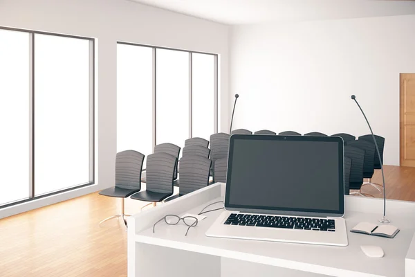 Conference hall with laptop — Stock Photo, Image