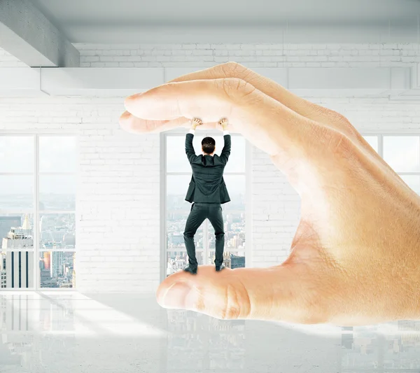 Trapped businessman in brick interior — Stock Photo, Image