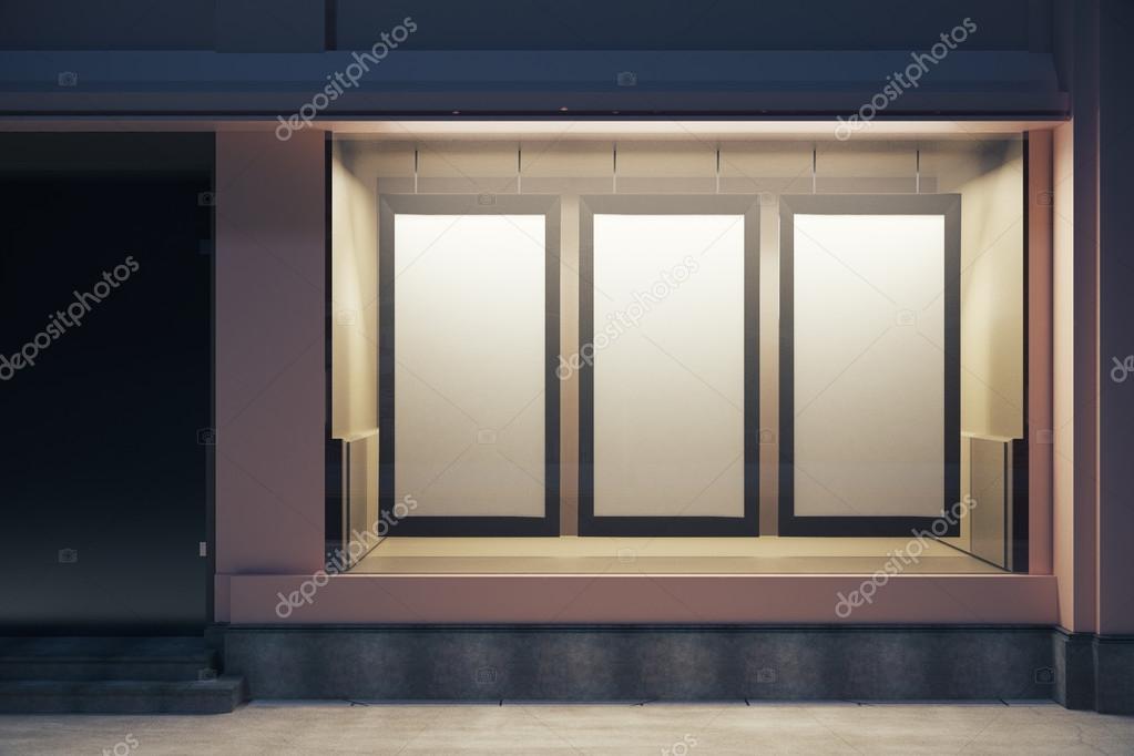 Blank storefront Storefront with blank posters at night — Stock Photo