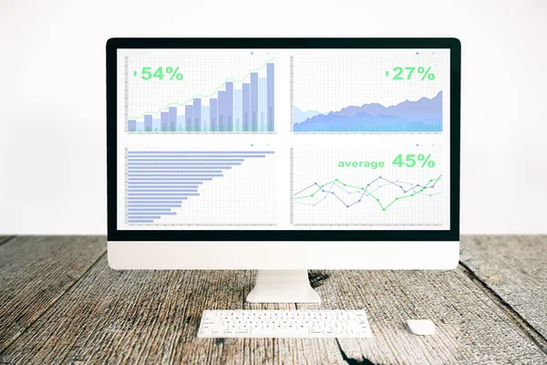 PC med business diagram — Stockfoto