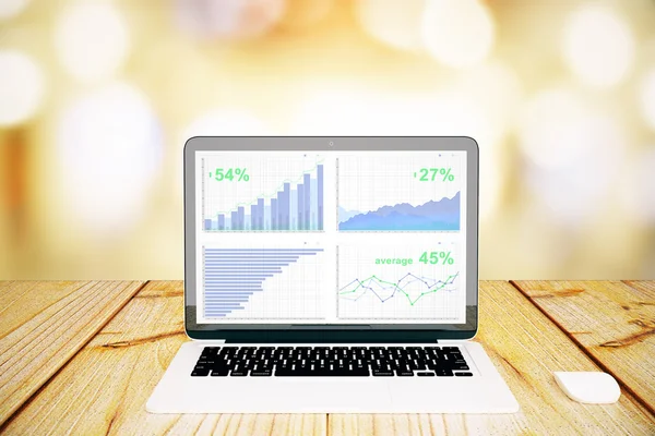 Laptop com diagrama de negócios — Fotografia de Stock
