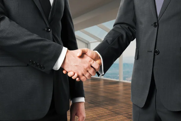 Businesspeople shaking hands — Stock Photo, Image