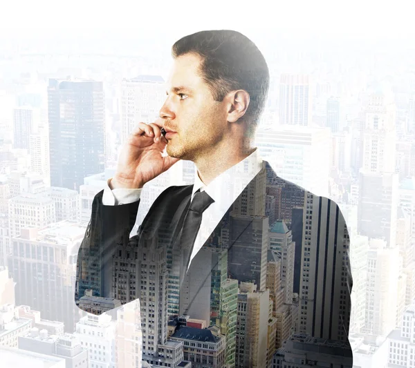 Businessman talking on phone multiexposure — Stock Photo, Image