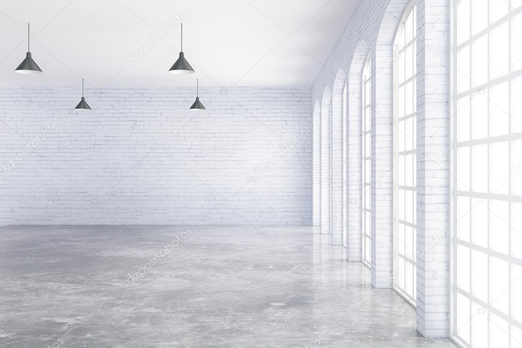 Empty white brick and concrete interior with ceiling lamps and window with no view. 3D Rendering