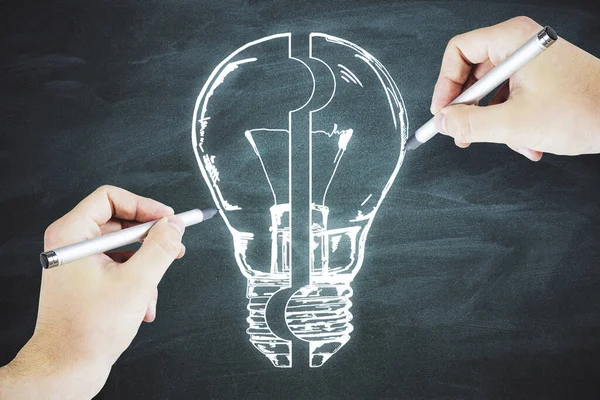 Two Hands Drawing Light Bulb Puzzle Blackboard Success Solution Concept — Stock Photo, Image