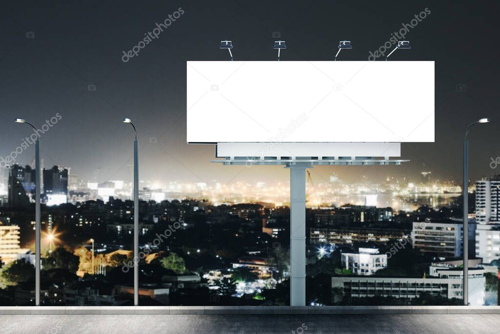 Empty billboard on night city background. Advertising and business concept. Mock up. 3D rendering