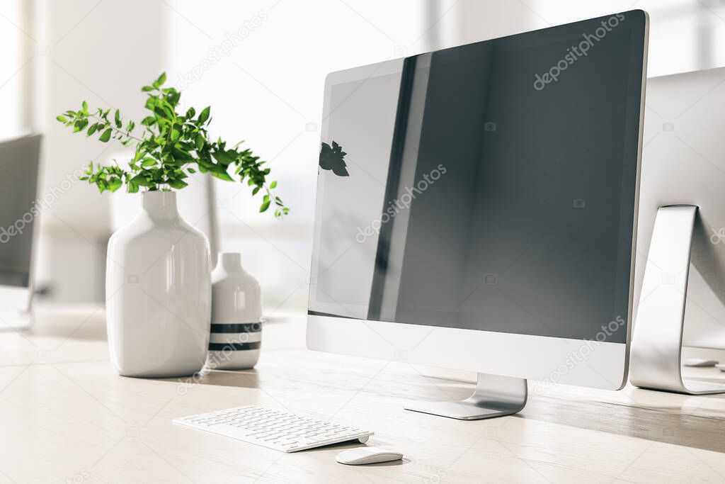 Modern office with computer on table with blank black screen. Workplace and company concept. 3d rendering