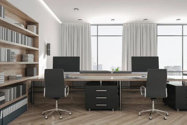 Modern loft style office with bookcase, city view  and computers on wooden table. Workplace and company concept. 3D Rendering