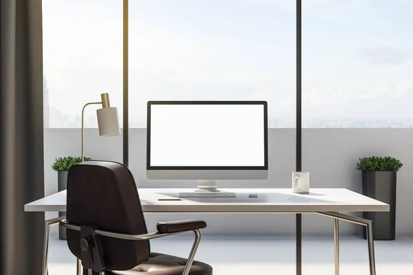 Contemporary desktop with empty white computer screen in office interior. Design and ad concept. Mock up, 3D Rendering